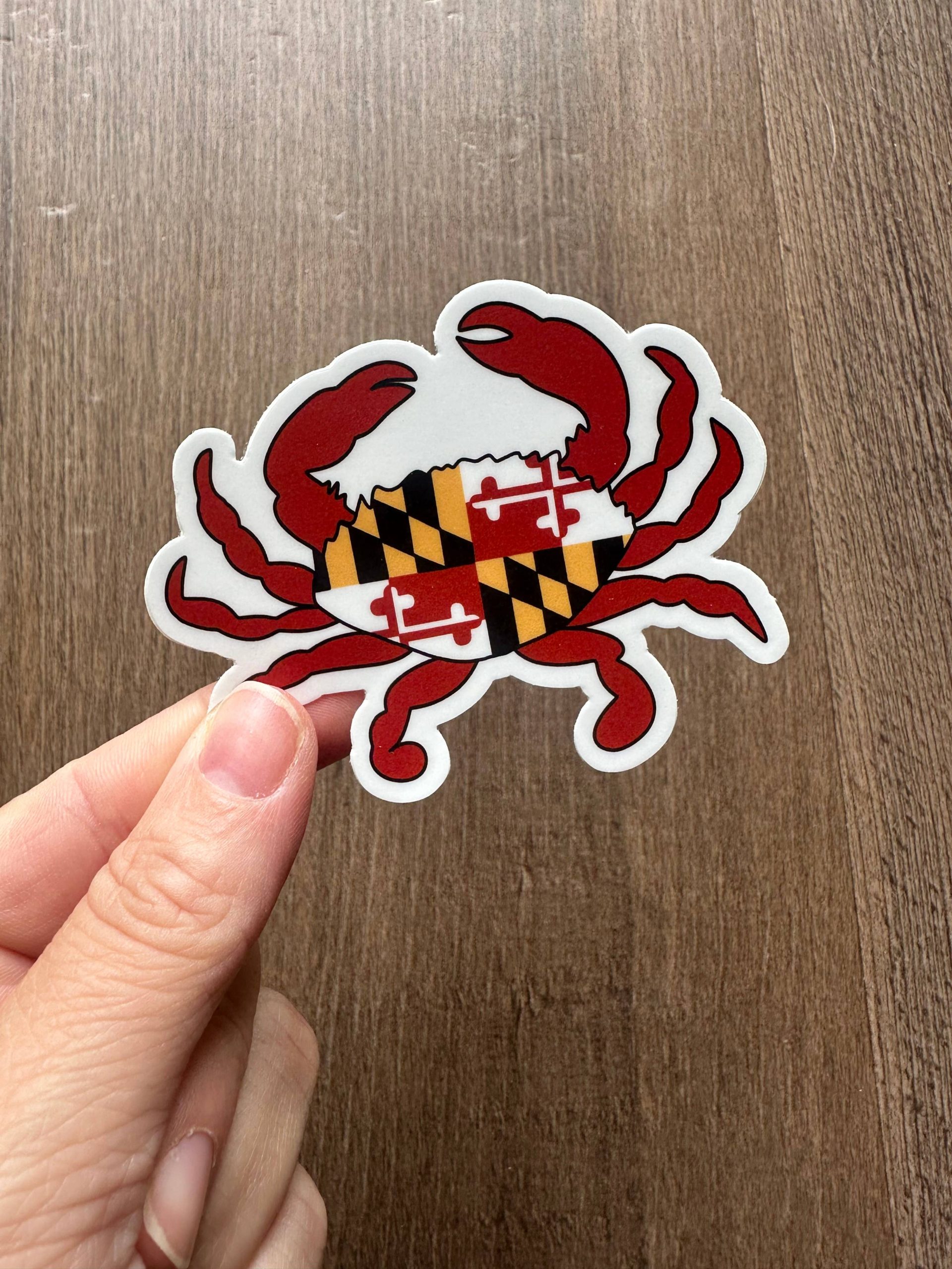 the letters mdn - Maryland Flag Crab Vinyl Sticker